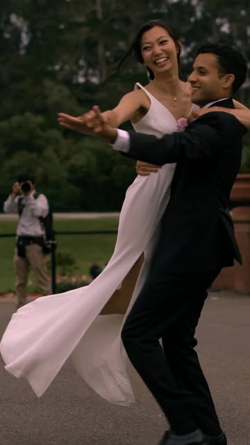 A couple dancing together outdoors